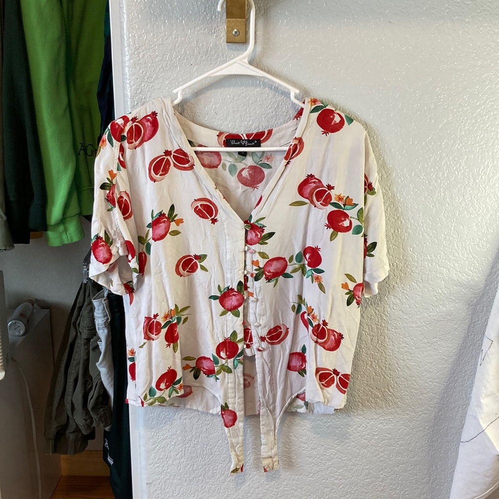 Tie front button down white shirt.